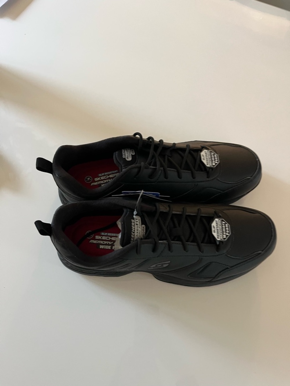 Skechers Men's Black Athletic Work Sneakers with Red Insole Accent